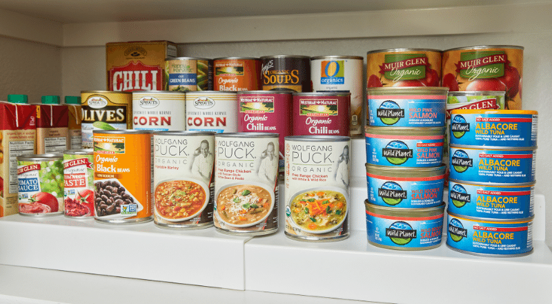 organized canned goods in pantry